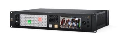 ATEM Constellation 8K video switcher with multiple control buttons and display.