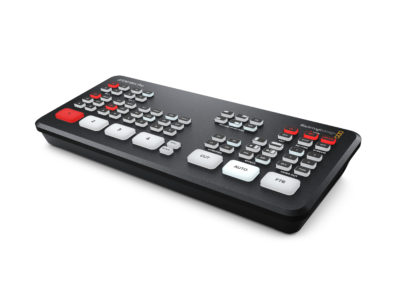 Professional video switcher with multiple control buttons and dials for broadcasting.