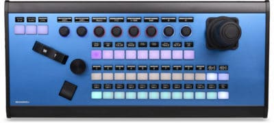 Professional PTZ camera control panel with joystick and buttons.