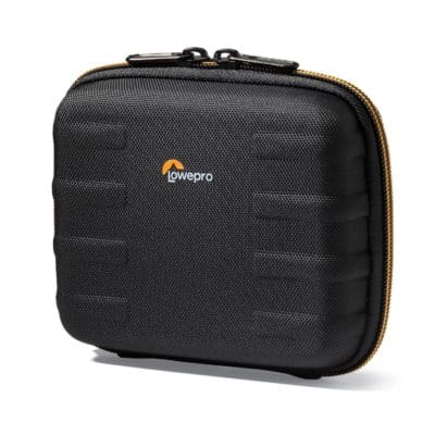 Lowepro camera case with black textured surface and gold zipper.