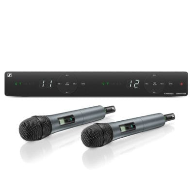 Wireless dual vocal set with handheld transmitters and stationary receiver.