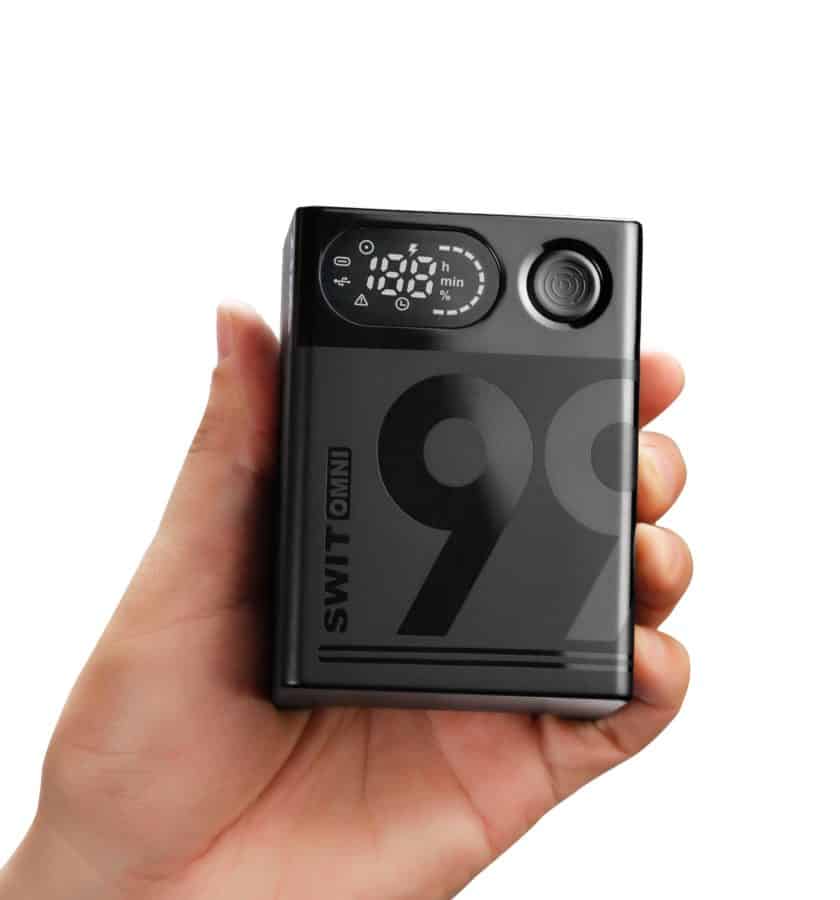 Compact portable timer device with digital display and control button.